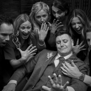 Grooms ring with smiling guests